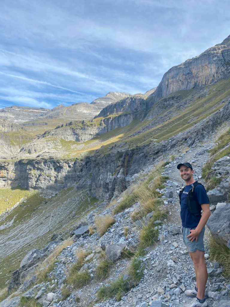 Nate poses on a trail run on a custom trip to Spain